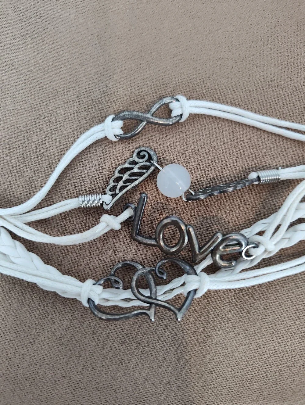 White Multi-Strand Charm Bracelet with Love & Wing Accents